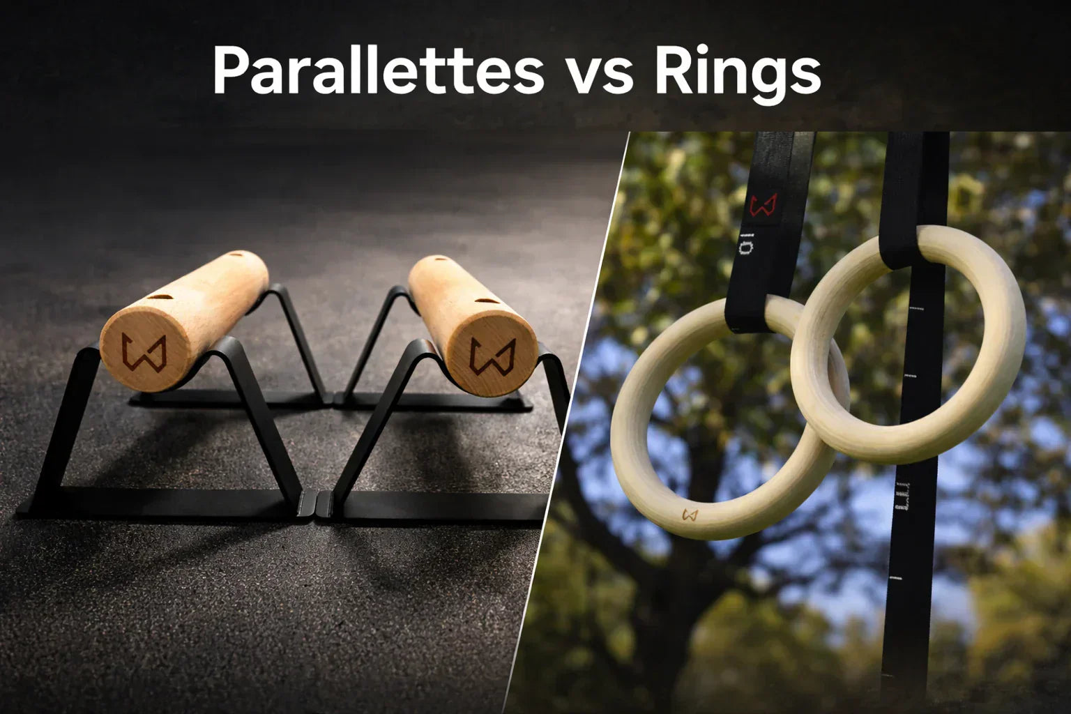 Wooden parallettes on a dark gym floor next to gymnastic rings hanging outdoors.
