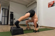 Pike push ups on parallettes