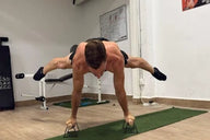 Straddle planche on parallettes