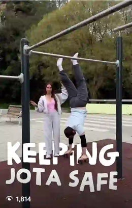 Female athlete doing exercises on parallettes
