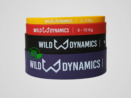 Stack of Wild Dynamics resistance bands on a light gray background