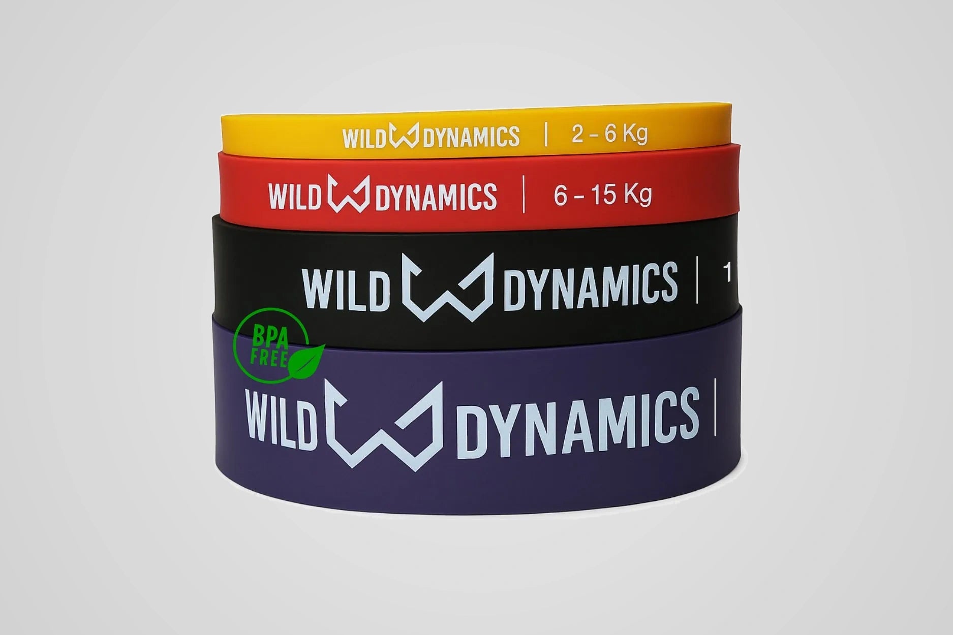 Stack of Wild Dynamics resistance bands on a light gray background